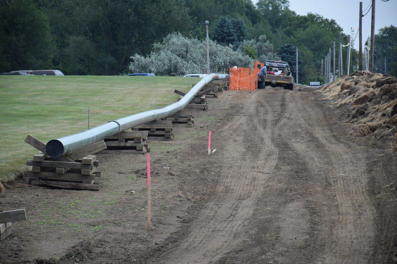 work continues along route 20 on risberg pipeline